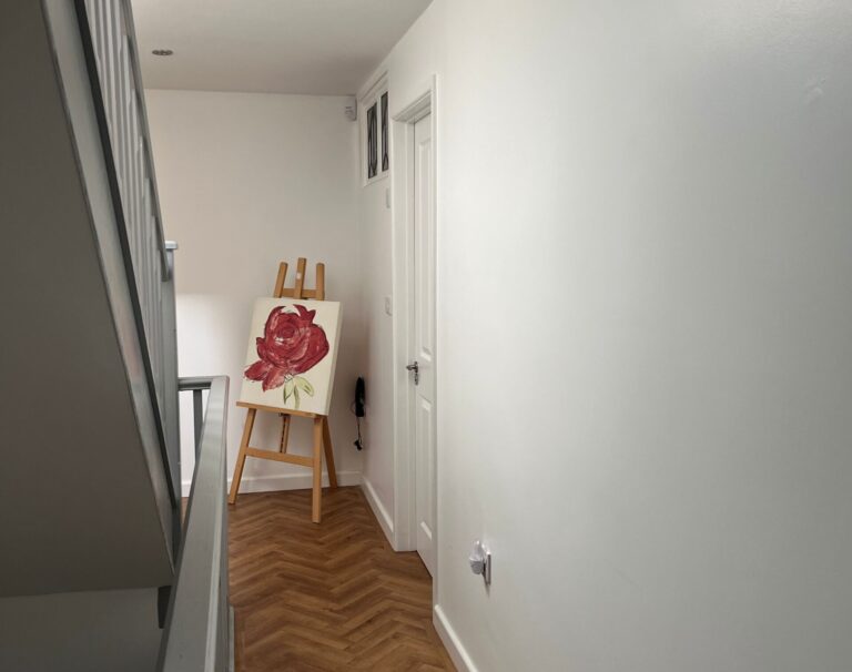 hallway with artwork